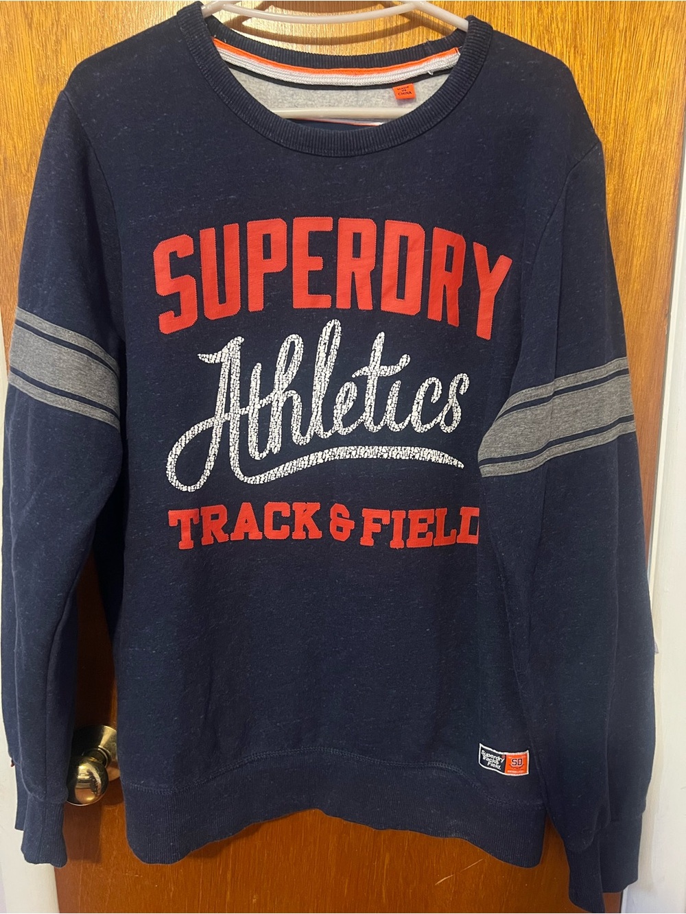 Superdry Navy Crewneck Sweatshirt with Red Logo and Gray Stripes